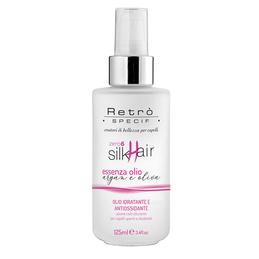 Olio idratante e antiossidante in flacone trasparente con tappo argentato.